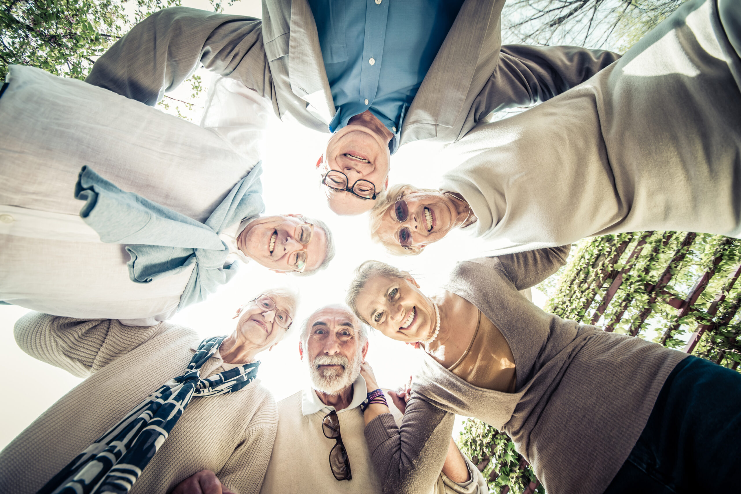 Group of senior people meeting outdoors - Old friends meeting outdoors